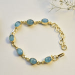Load image into Gallery viewer, Minimal sleek size adjustable easy to stack versatile dainty blue crystal bracelet