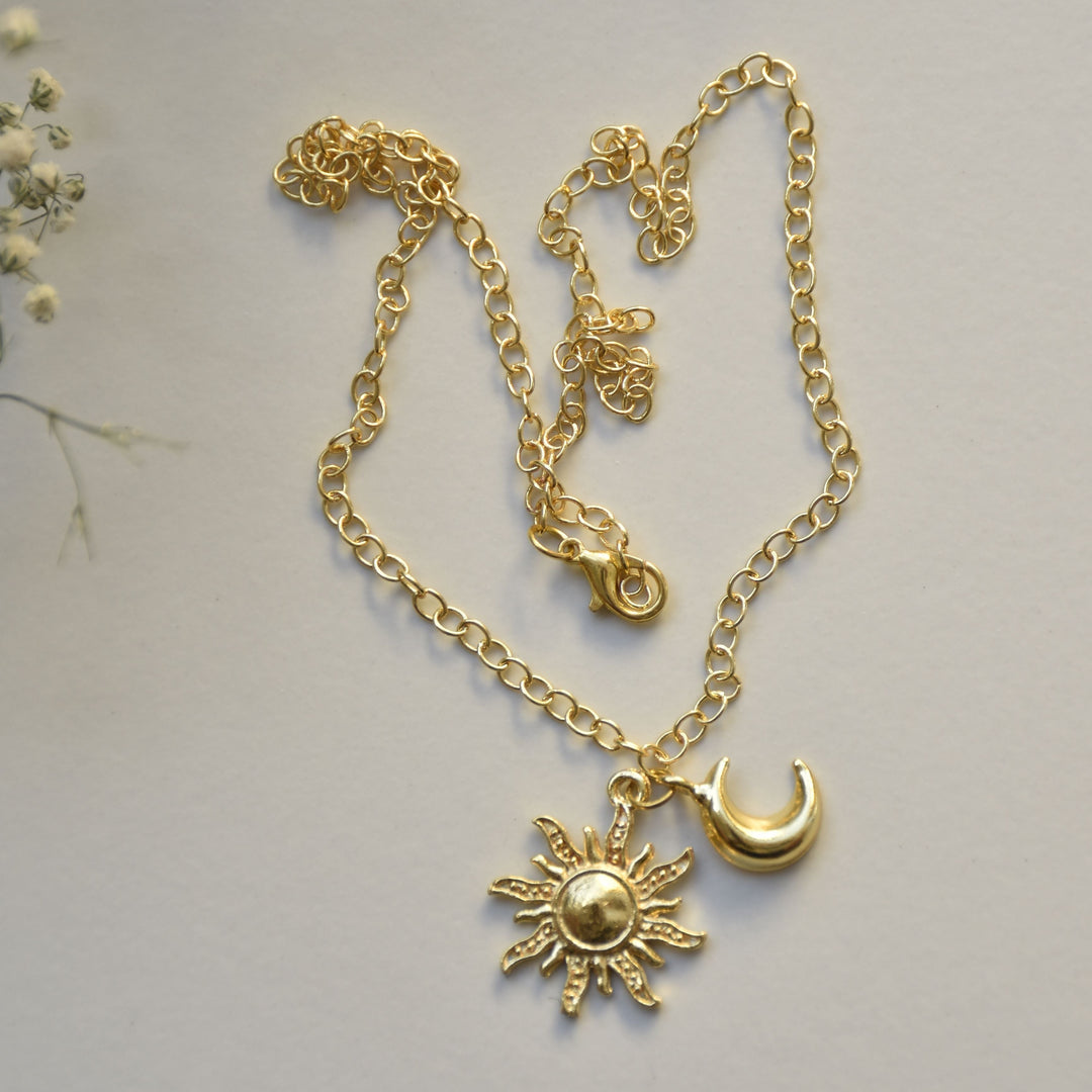 Celestial inspired sun moon minimal brass vacation stackable easy to adjust charm necklace chain