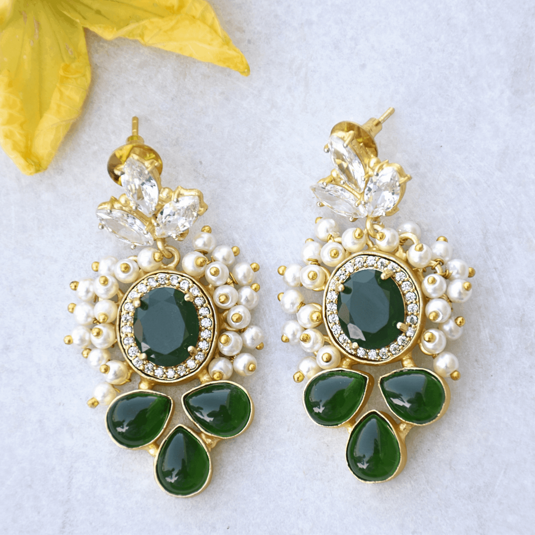 Festive wear statement crystal embellished green party wear earrings
