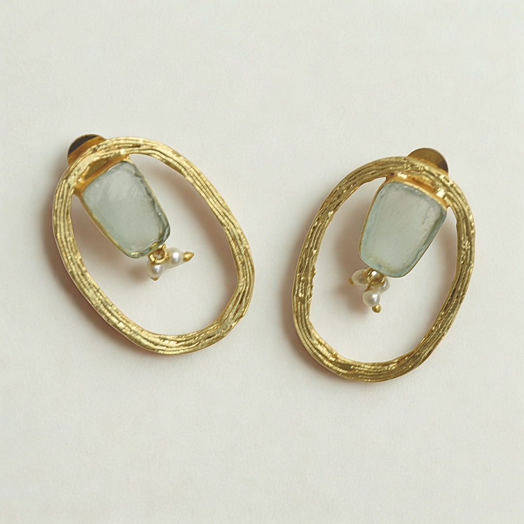 Natural gemstone qua old plated with dangling pear adding  touch of beauty to earrings stud