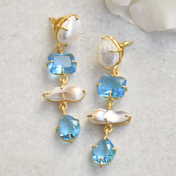Modern and edgy long pearl and crystal lightweight earrings