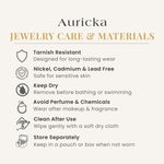 Load image into Gallery viewer, Auricka jewelry care and materials information on a white background