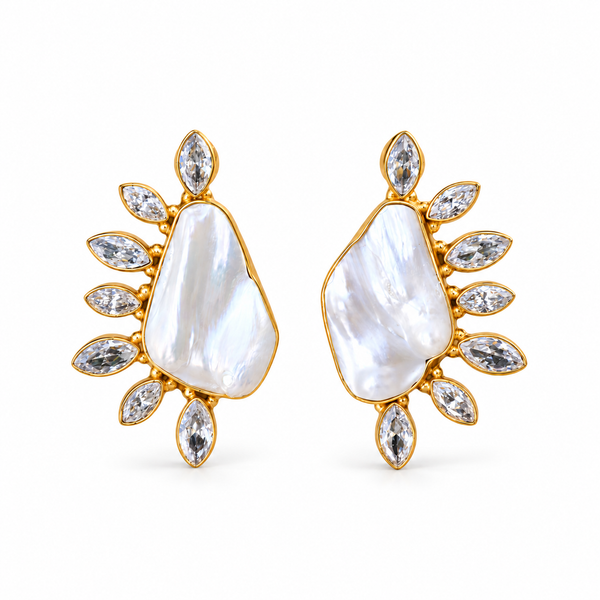 Pair of baroque pearl and cubic zirconia leaf-frame stud earrings in gold-tone settings on a white background