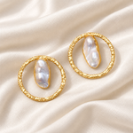 Load image into Gallery viewer, Baroque pearl open circle stud earrings arranged on ivory silk