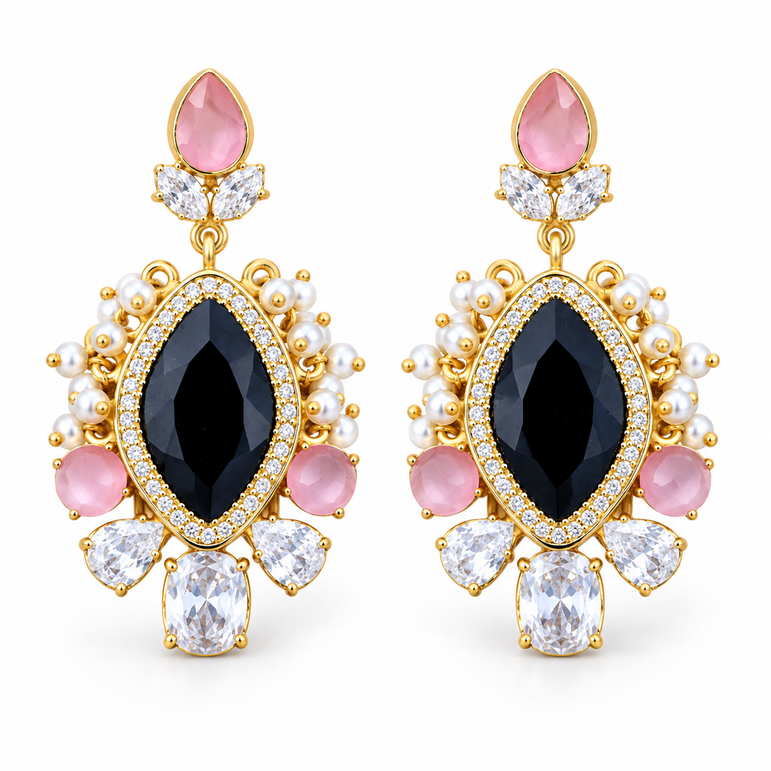 Black and pink crystal statement earrings with clear drops and white bead accents on white