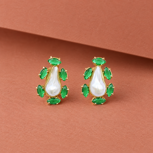 Pearl & Green Crystal Teardrop Stud Earrings on terracotta paper