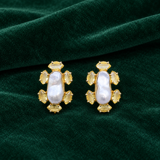 Pearl & Yellow Crystal Stud Earrings on forest velvet
